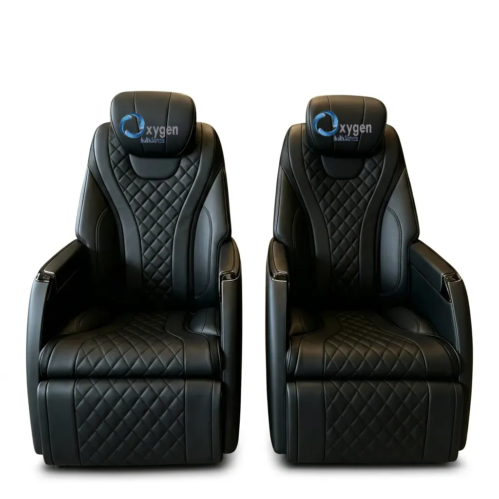 Premium business-inspired fully adjustable comfort seating in black — two quilted black leather captain's chairs with diamond stitching, integrated headrests, and padded armrests